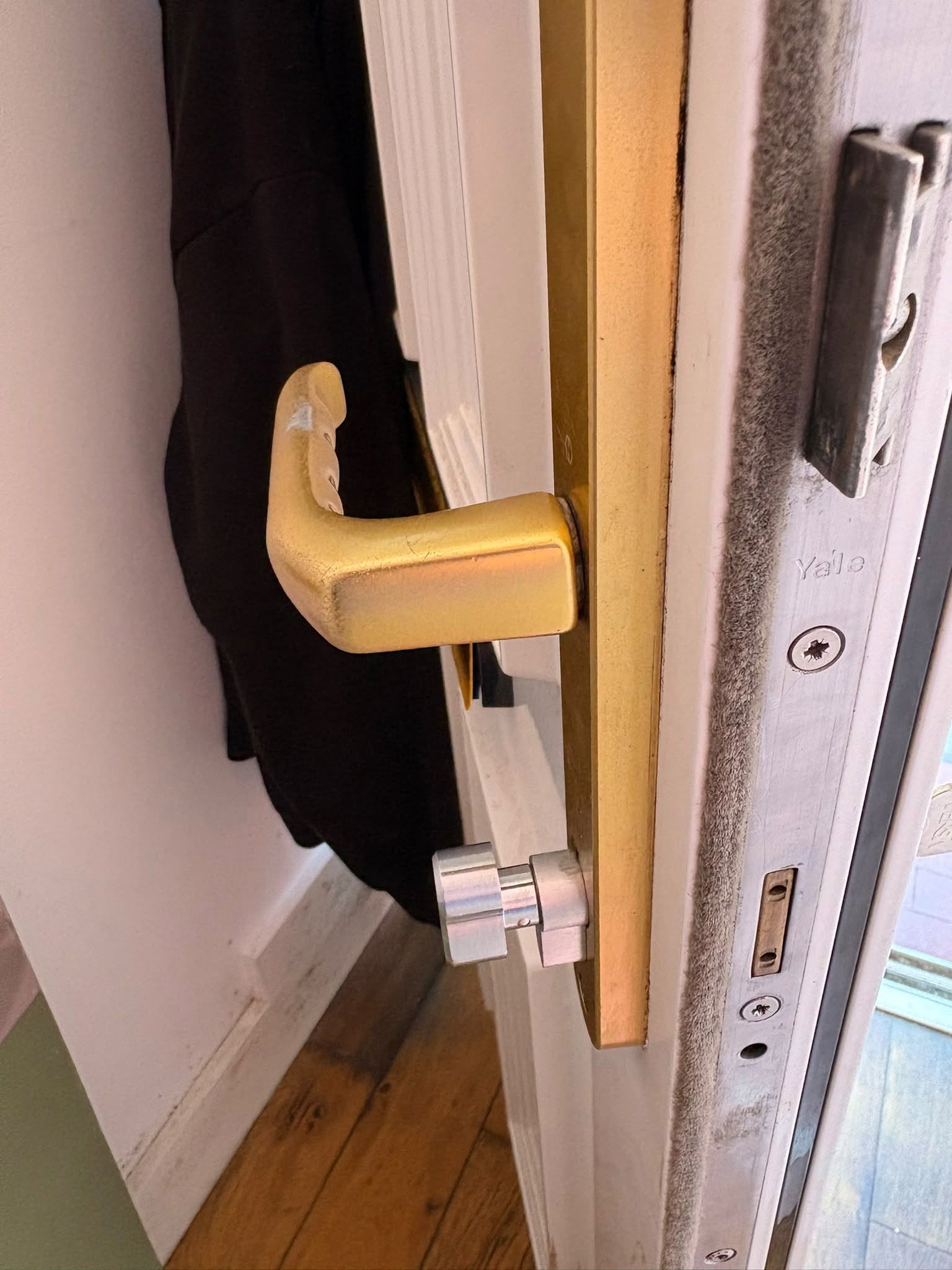 Locksmith repairing damaged door locks in Ballyclare