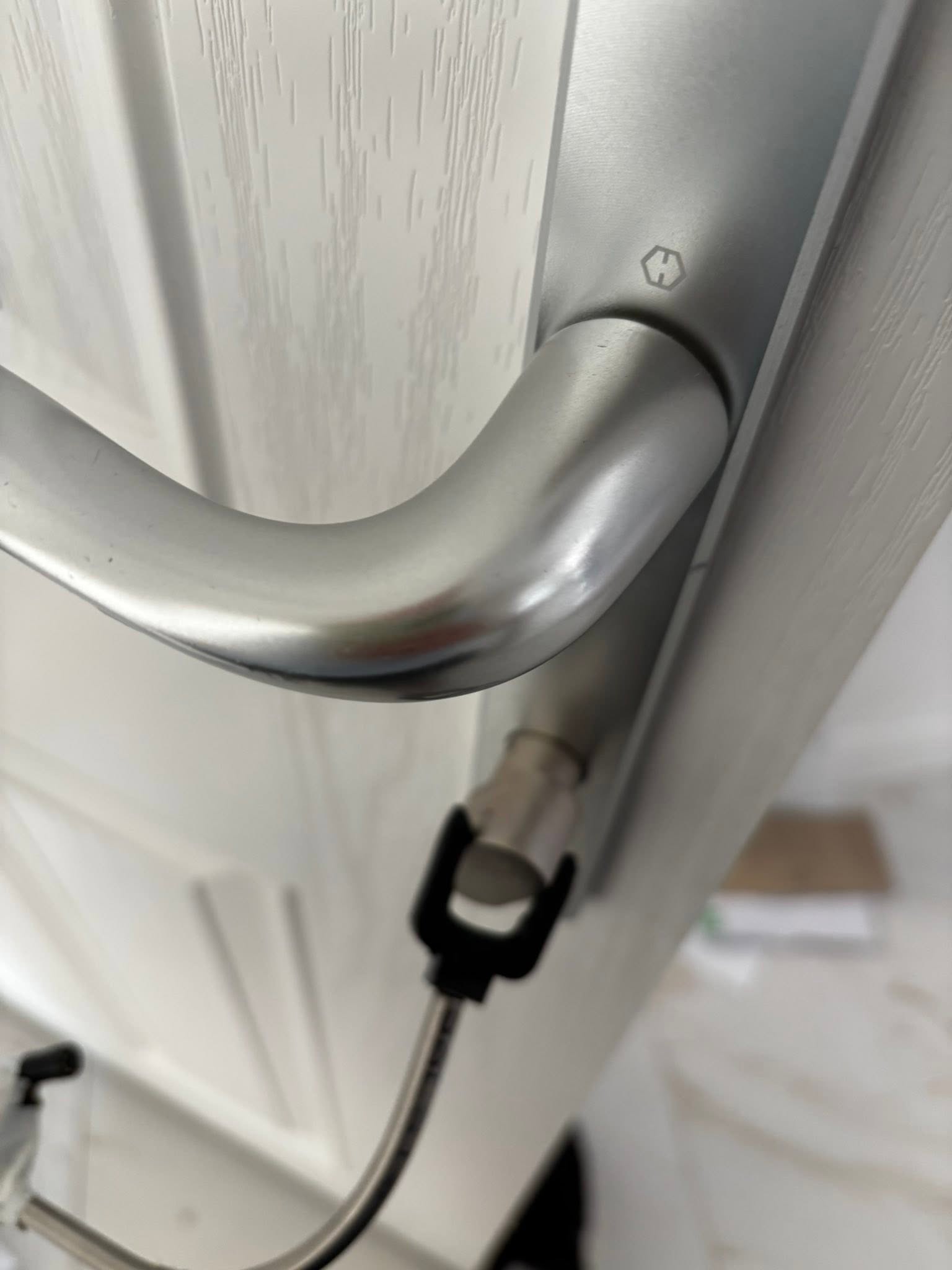repairing a loose door handle in Belfast
